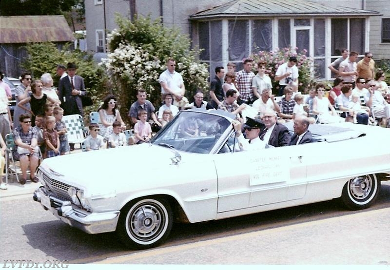 1965: 50th parade Charter Members Frank Guy and Barney Smith